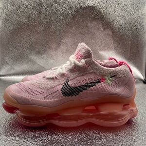 Nike Pink Athletic Shoes with Black Swoosh